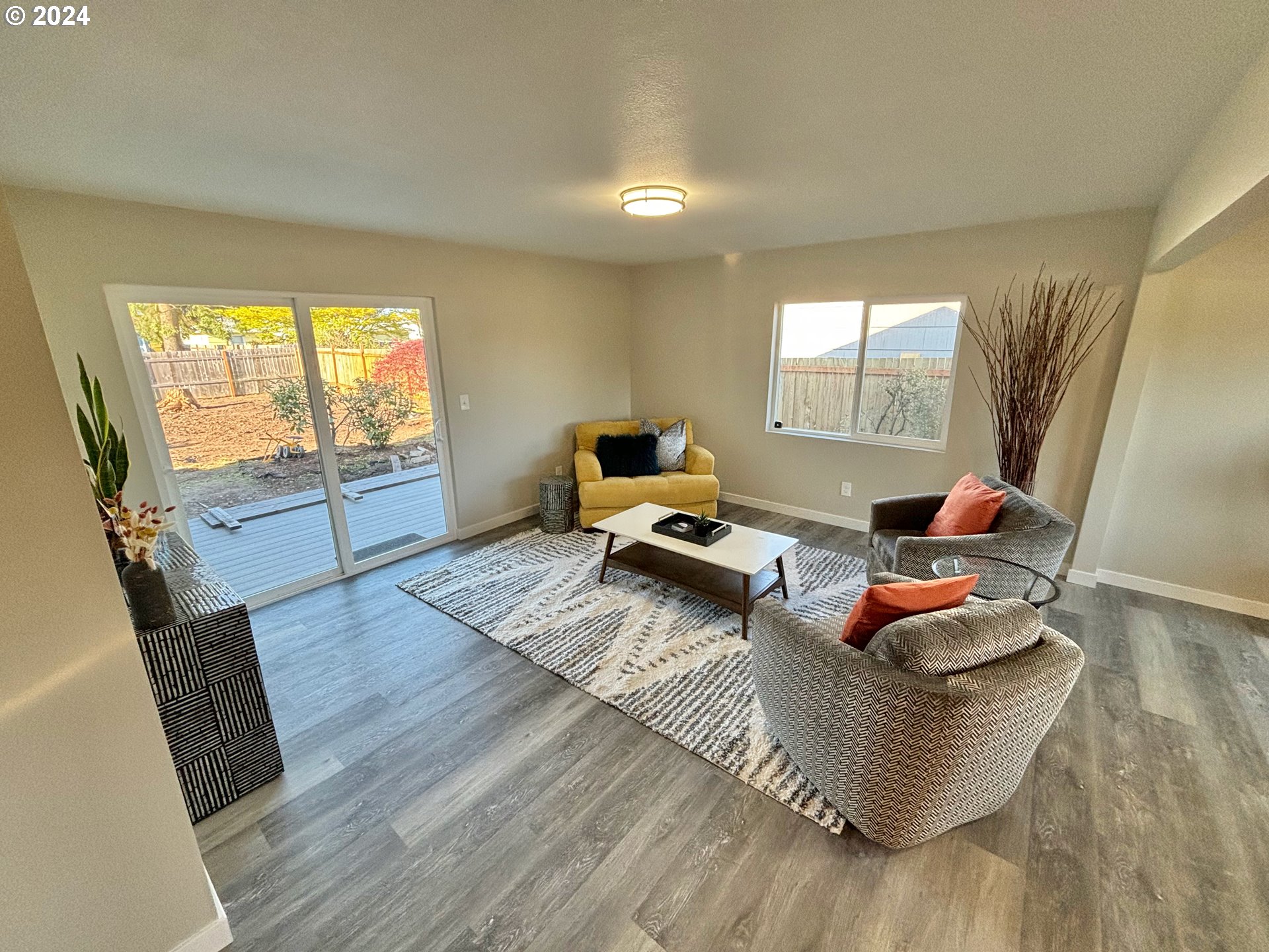 2140 J Street Springfield, OR 97477 - Photo 5 of 23 a living room with furniture and a wooden floor