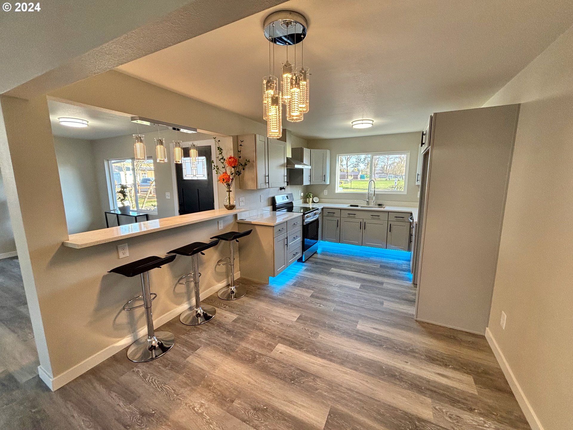 2140 J Street Springfield, OR 97477 - Photo 6 of 23 a kitchen with refrigerator and window