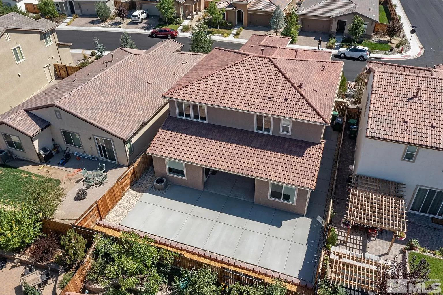 1925 Dutch Draft Drive Reno, NV 89521 - Photo 10 of 10 an aerial view of a house with a balcony and wooden stairs
