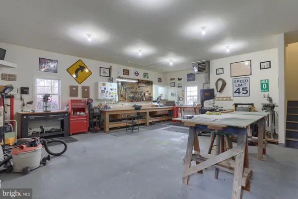 a kitchen with a sink appliances and cabinets