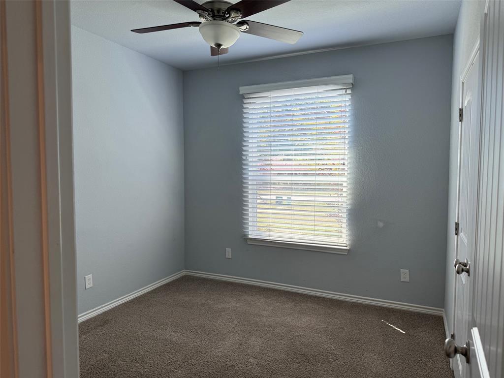 792 East Northside Drive Pilot Point, TX 76258 - Photo 14 of 18 a view of an empty room with a window