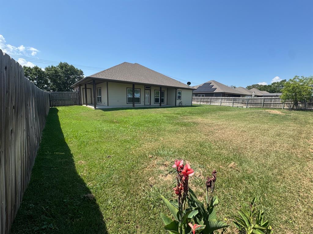 792 East Northside Drive Pilot Point, TX 76258 - Photo 17 of 18 a view of a house with a yard
