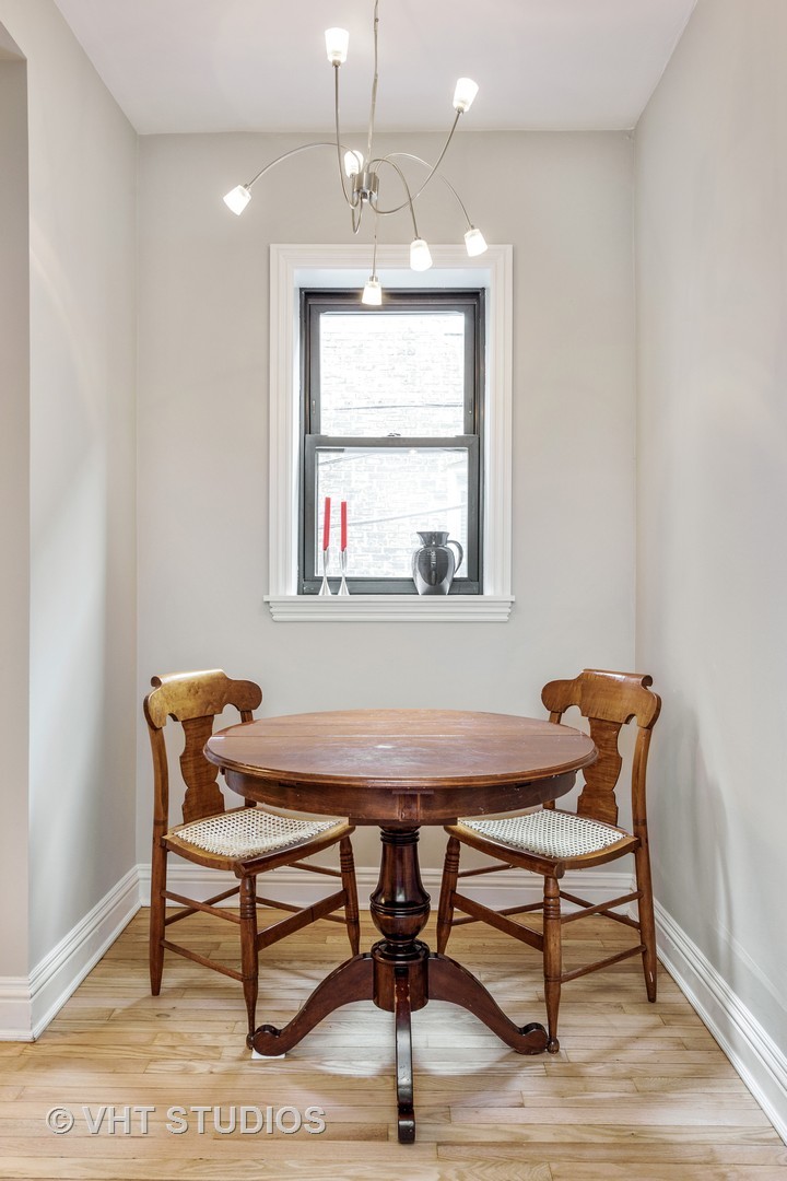 535 West Addison Street, Unit 2E Chicago, IL 60613 - Photo 8 of 11 a view of a work space with furniture and window
