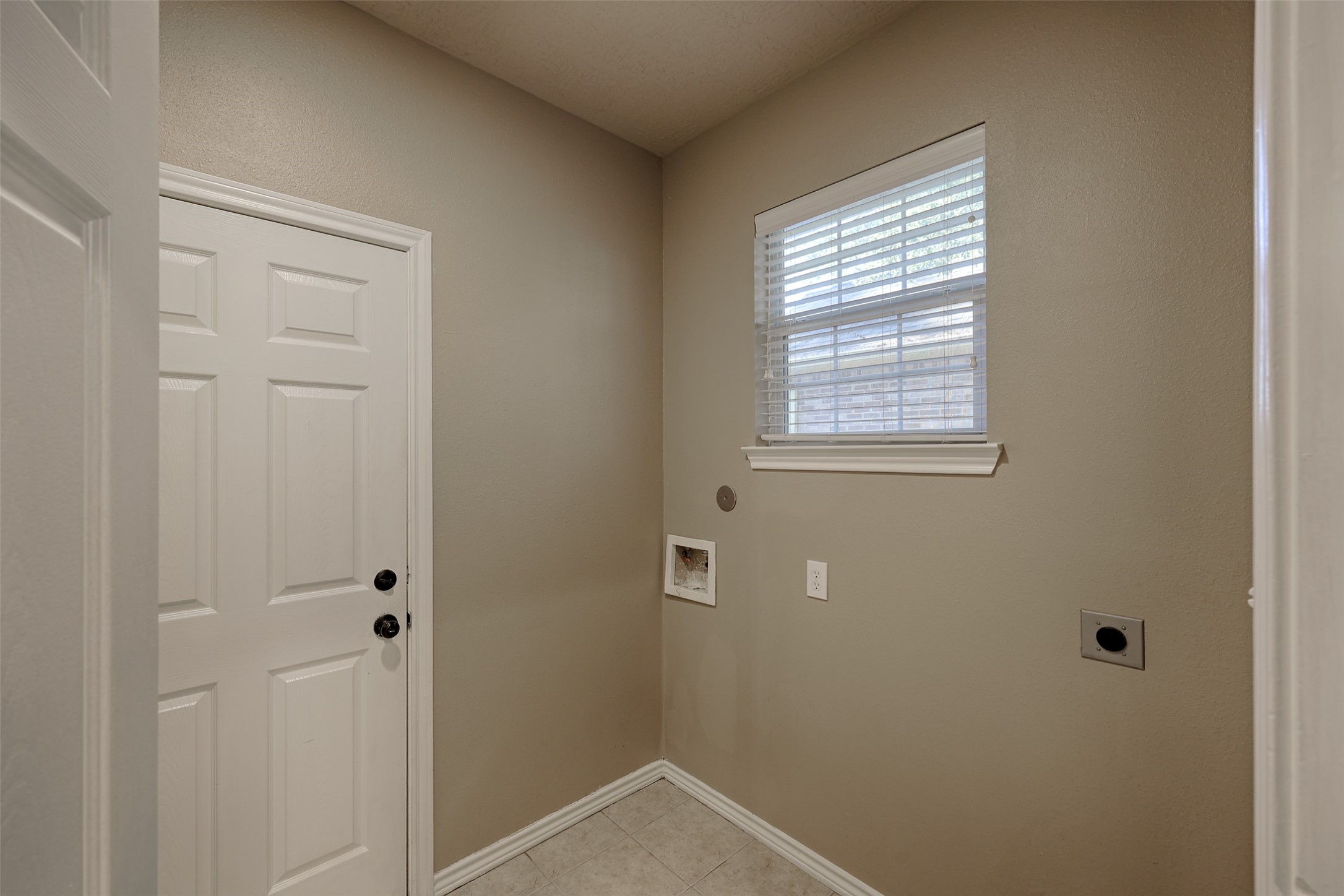 14918 Pollux Drive Willis, TX 77318 - Photo 18 of 46 a view of an empty room with a window