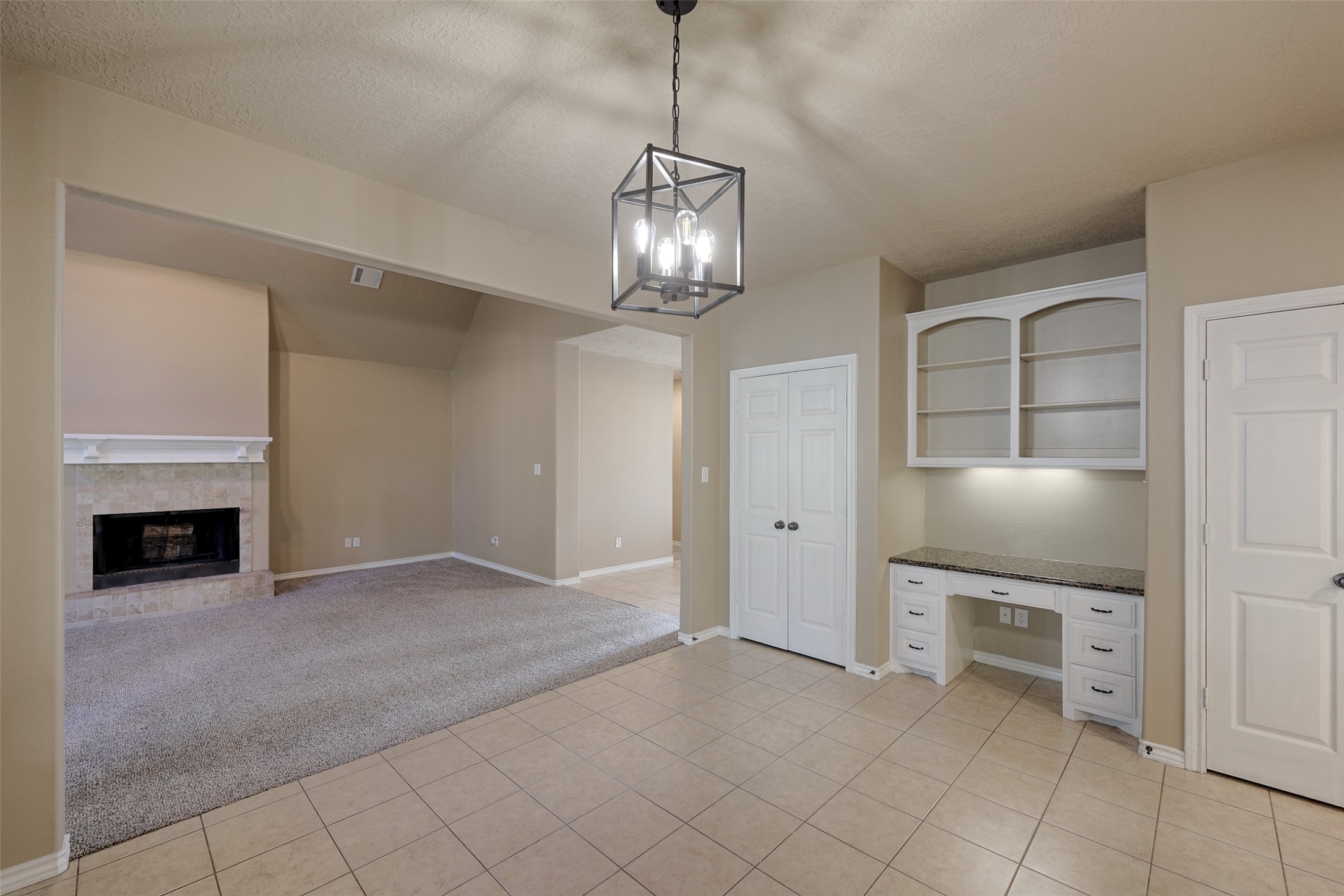 14918 Pollux Drive Willis, TX 77318 - Photo 22 of 46 a view of a livingroom with a chandelier