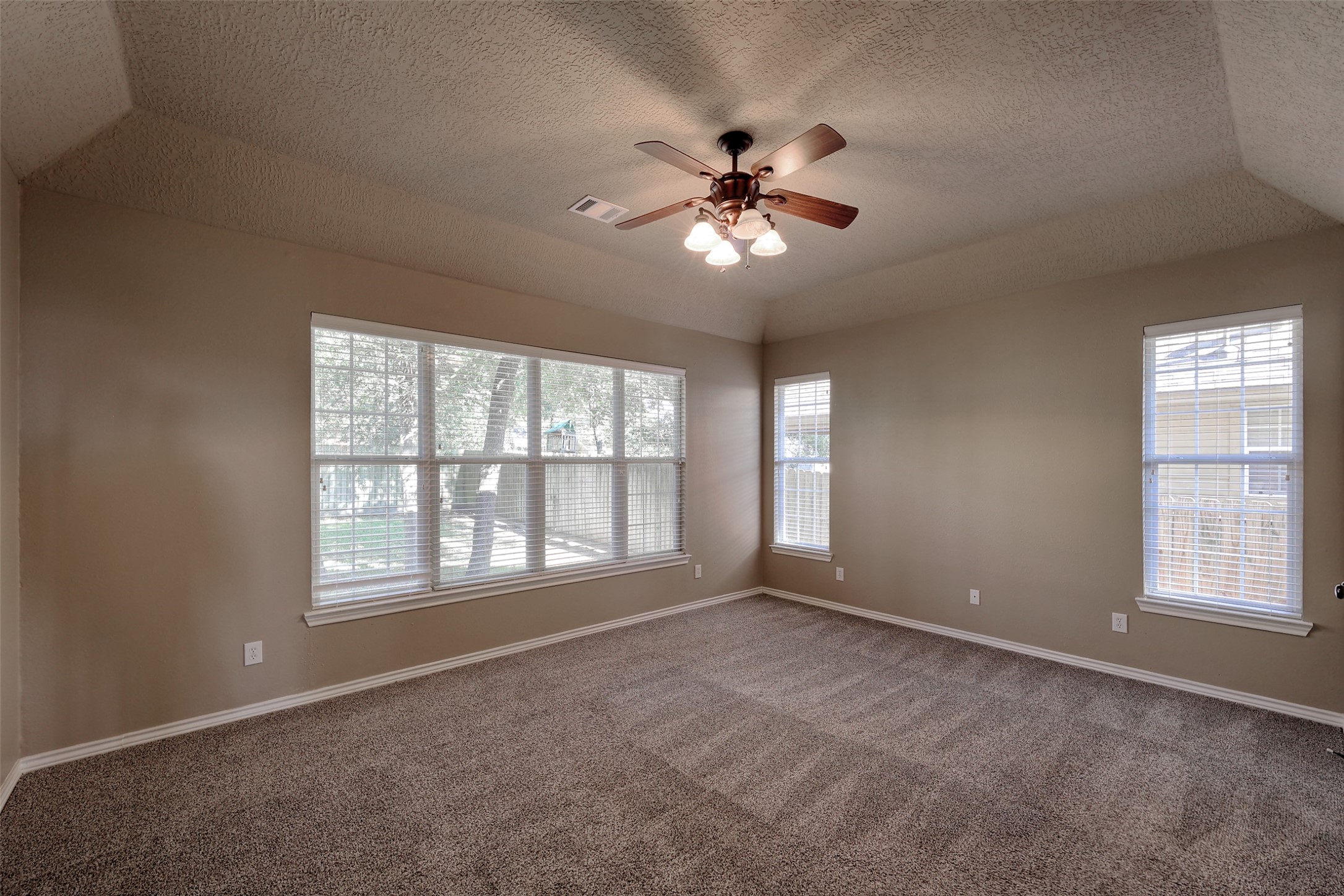 14918 Pollux Drive Willis, TX 77318 - Photo 27 of 46 a view of an empty room with a window