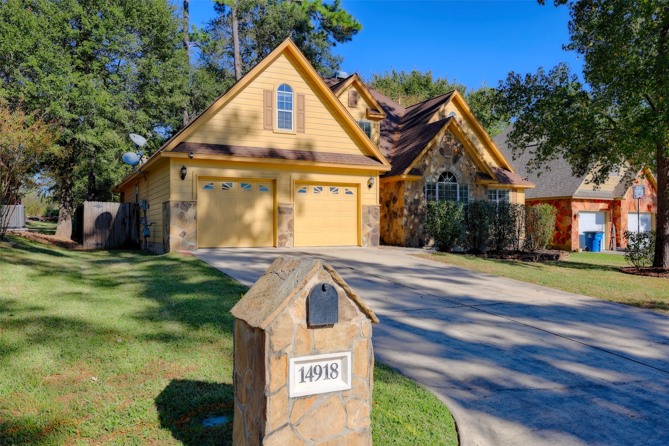 14918 Pollux Drive Willis, TX 77318 - Photo 3 of 46 a view of a house with a yard