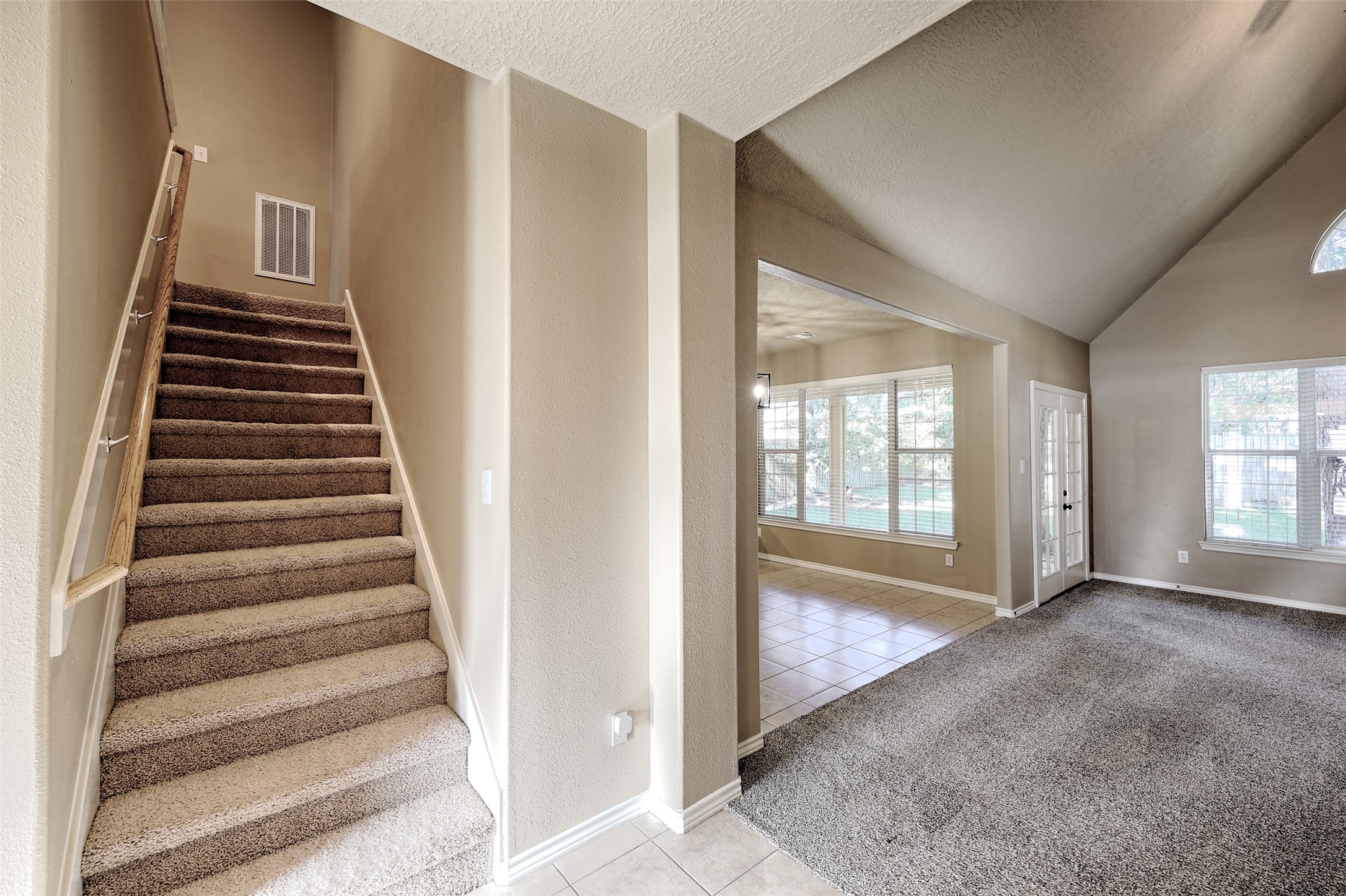 14918 Pollux Drive Willis, TX 77318 - Photo 31 of 46 a view of an entryway with staircase