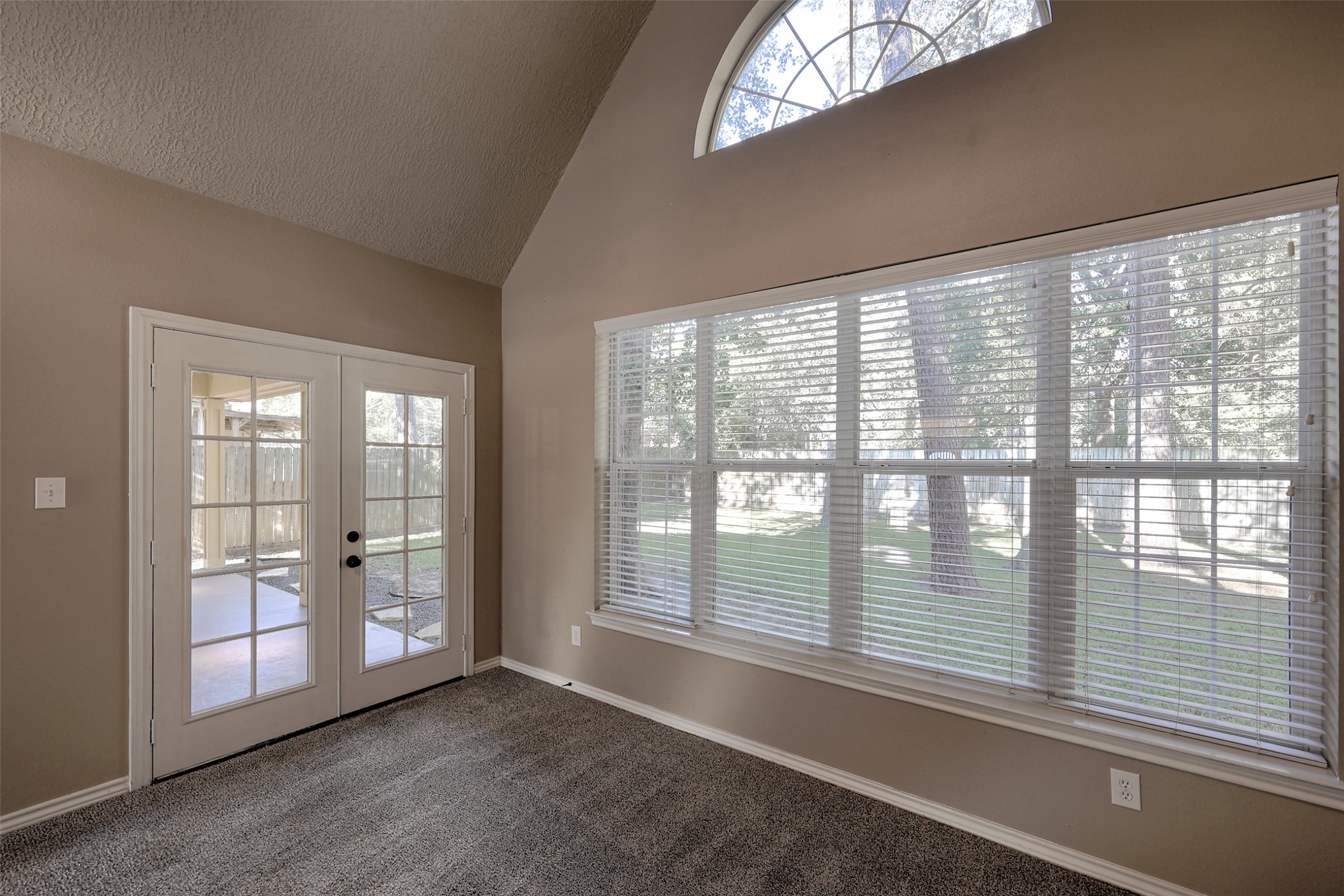 14918 Pollux Drive Willis, TX 77318 - Photo 38 of 46 a view of an empty room with windows