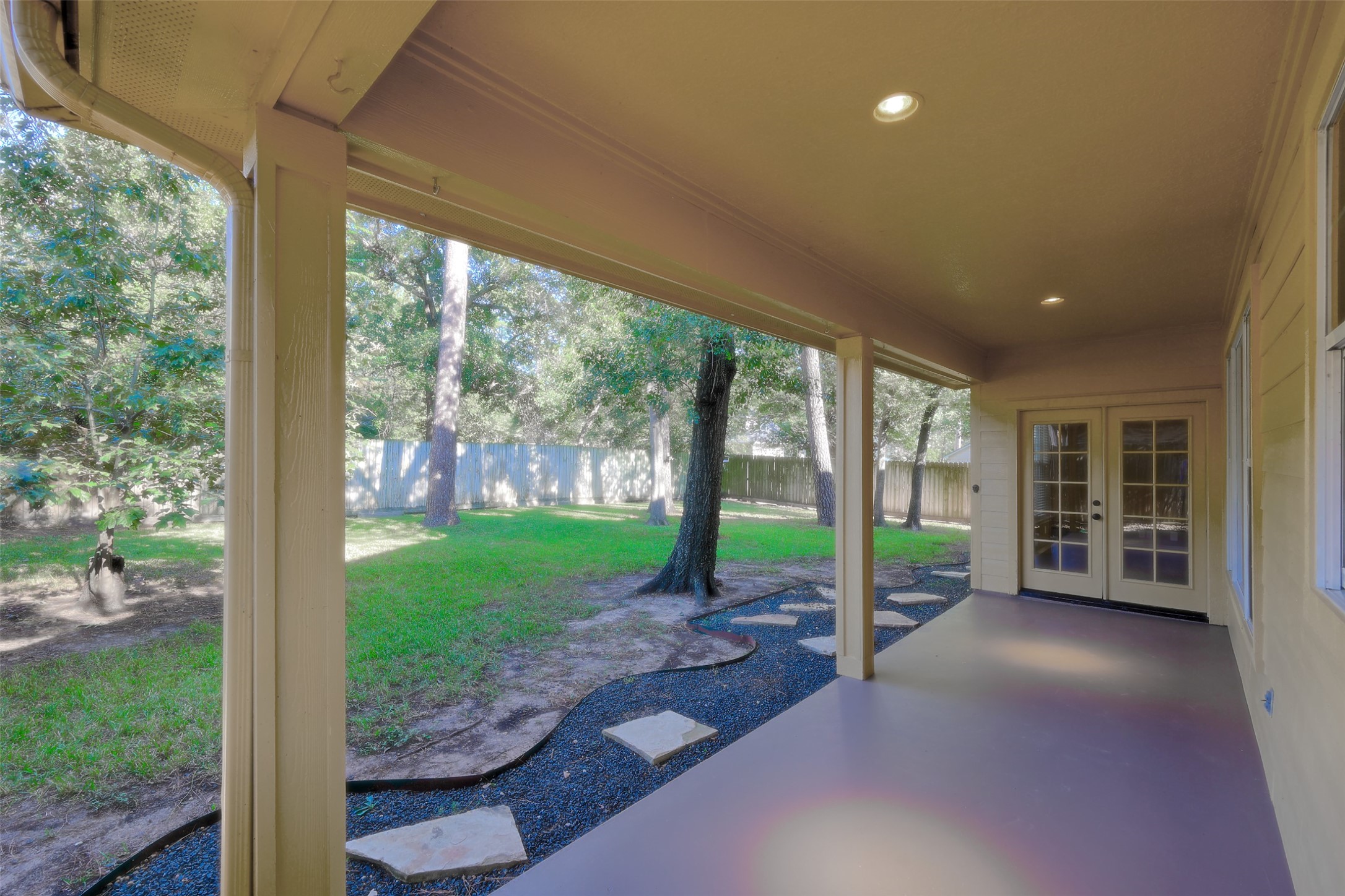 14918 Pollux Drive Willis, TX 77318 - Photo 39 of 46 a view of a room with porch and garden