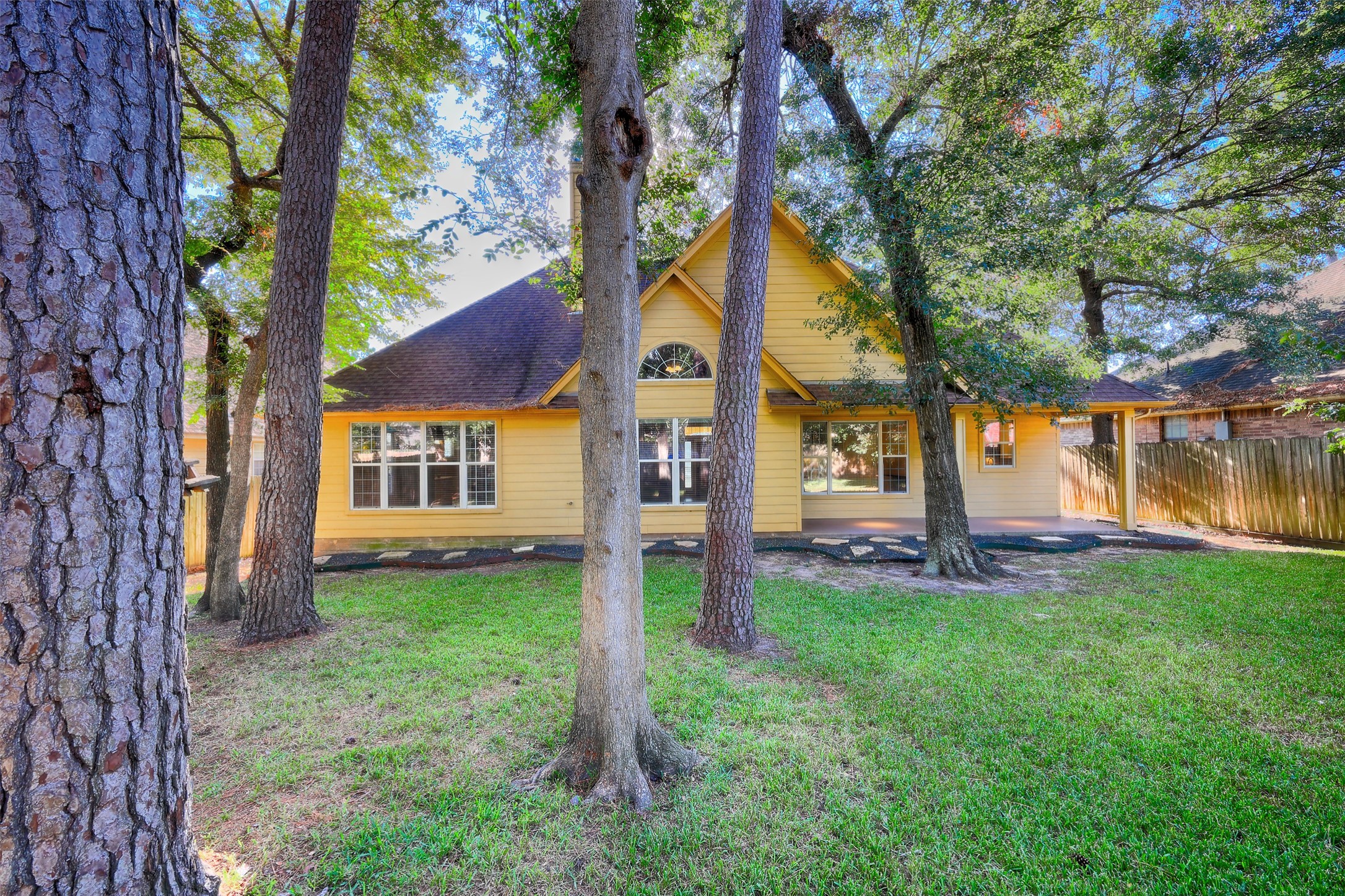 14918 Pollux Drive Willis, TX 77318 - Photo 41 of 46 a view of a house with a yard and tree s