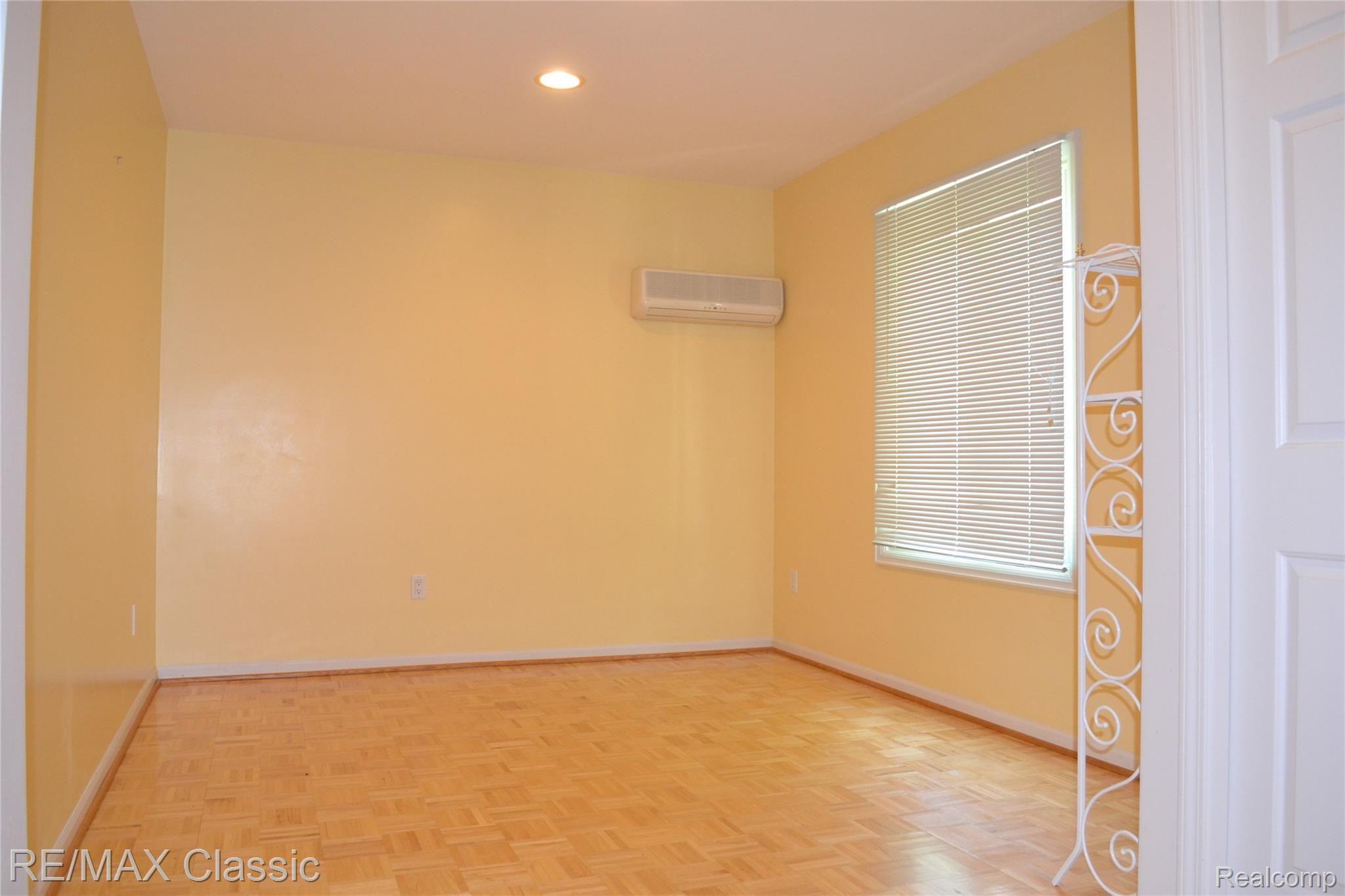 4443 Ravinewood Drive Commerce Township, MI 48382 - Photo 22 of 46 Attached Bedroom to Living Room
