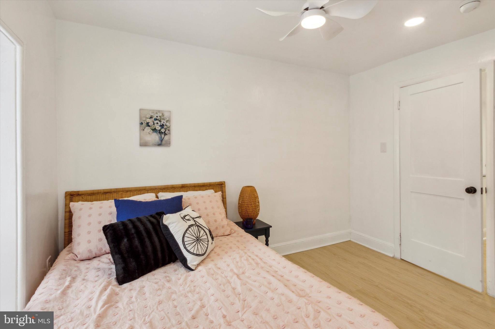 42 East Haines Street, Unit 2 Philadelphia, PA 19144 - Photo 7 of 11 a bedroom with a bed and teddy bear on bed
