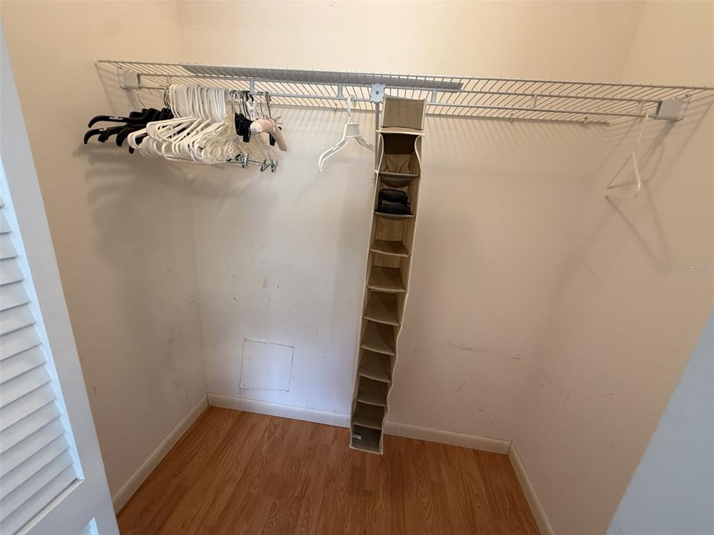 9290 Southwest 89th Terrace, Unit B Ocala, FL 34481 - Photo 17 of 20 a view of a walk in closet
