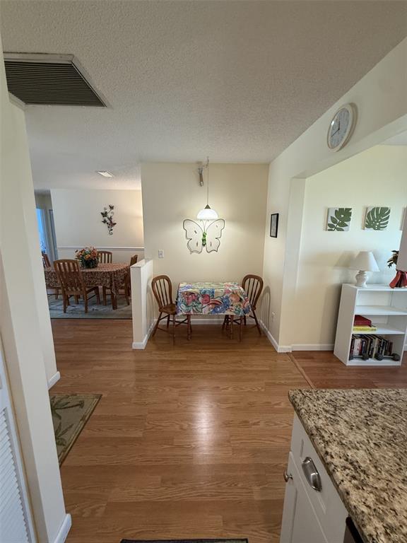 9290 Southwest 89th Terrace, Unit B Ocala, FL 34481 - Photo 5 of 20 a living room with furniture