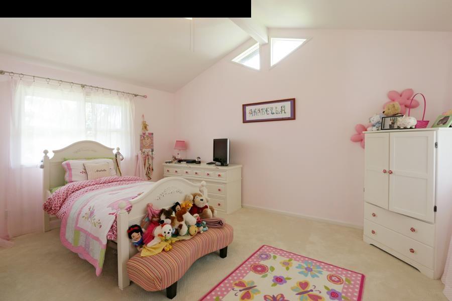 700 Pakanu Street Haiku, HI 96708 - Photo 12 of 28 a bedroom with a bed and a dresser