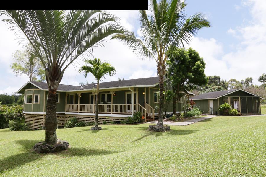 700 Pakanu Street Haiku, HI 96708 - Photo 23 of 28 a front view of a house with a garden