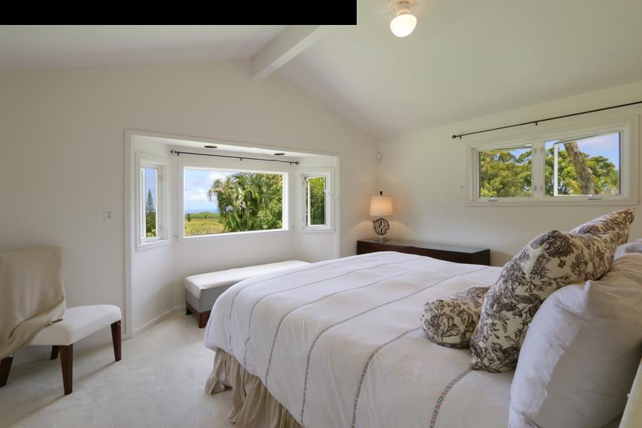 700 Pakanu Street Haiku, HI 96708 - Photo 9 of 28 a bedroom with a bed and a window
