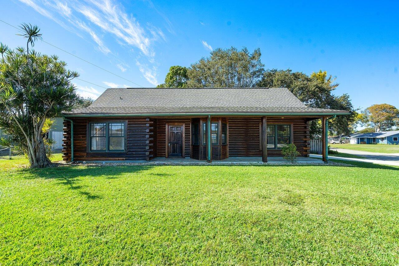 4963 Bonanza Road Lake Worth, FL 33467 - Photo 1 of 27 002-4963BonanzaRoad-LakeWorth-FL-33467-S
