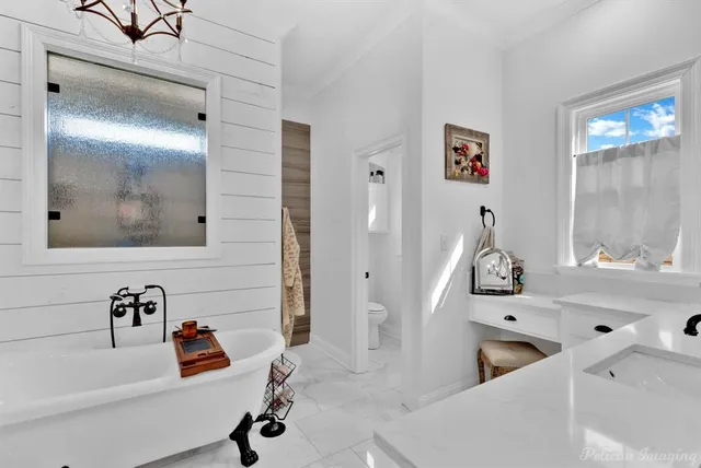 a view of a bath tub sitting in a bathroom