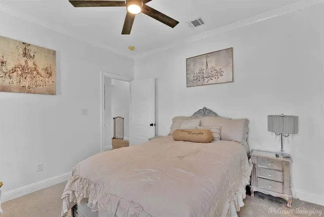 a view of a porch with furniture and a yard