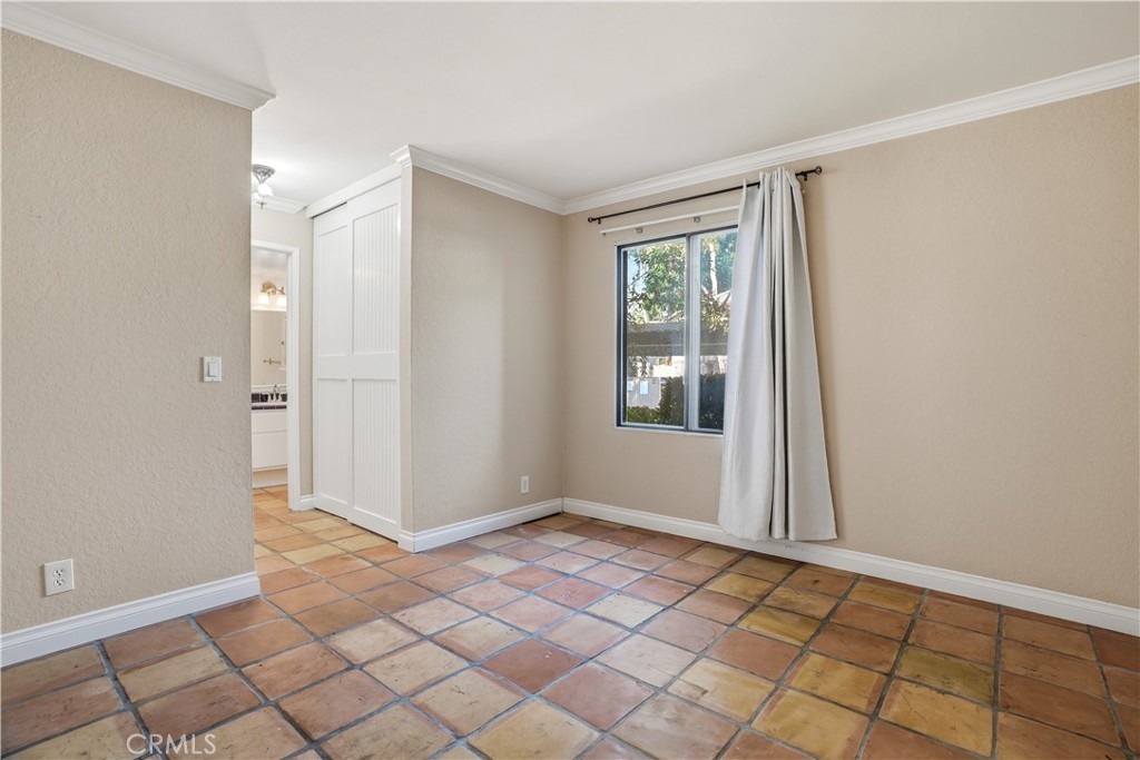 20702 El Toro Road, Unit 231 Lake Forest, CA 92630 - Photo 23 of 36 a view of an empty room and window