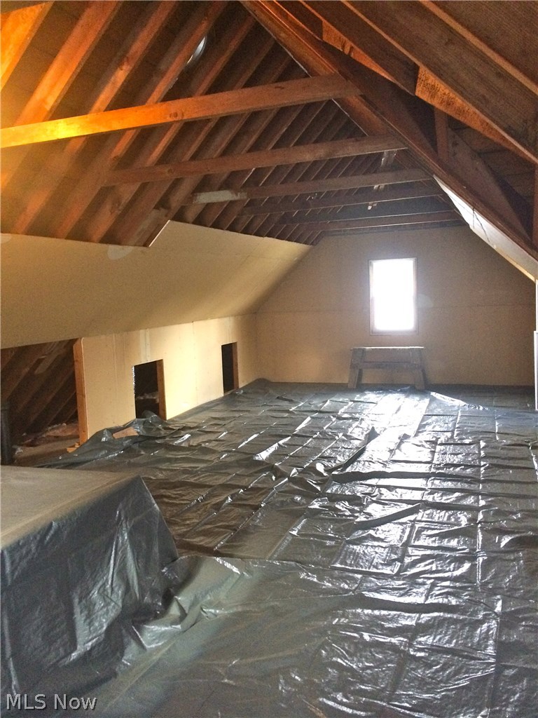 5950 Broadview Road Parma, OH 44134 - Photo 11 of 19 Partially finished upstairs bedroom. Provides tons of easy access storage, or additional living space once finished.