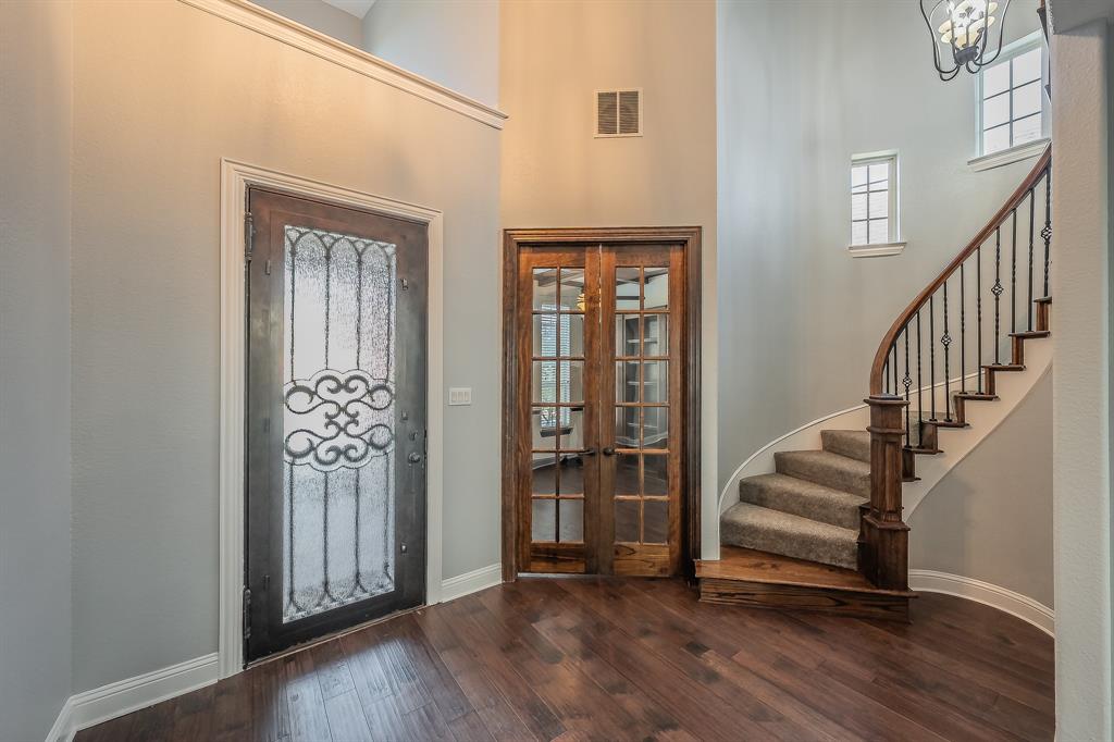 2823 Exeter Drive Trophy Club, TX 76262 - Photo 2 of 40 a view of entryway with stairs and wooden floor