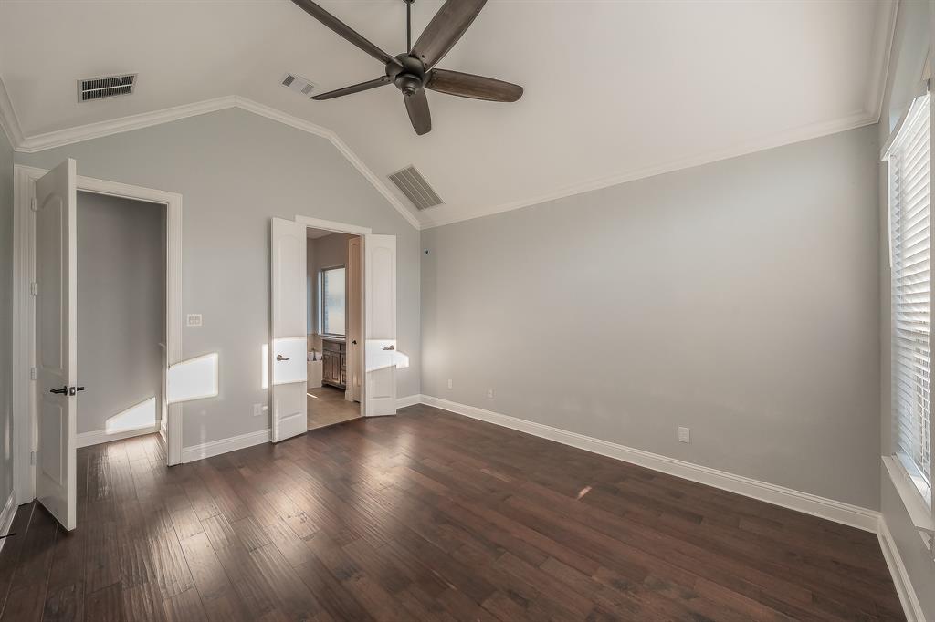 2823 Exeter Drive Trophy Club, TX 76262 - Photo 24 of 40 wooden floor in an empty room with a window