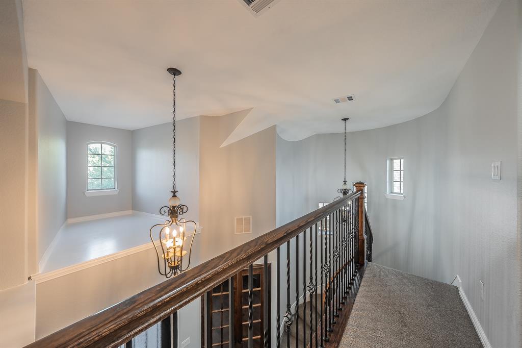 2823 Exeter Drive Trophy Club, TX 76262 - Photo 27 of 40 a view of a hallway with windows