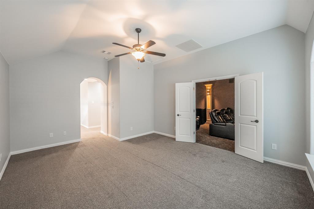 2823 Exeter Drive Trophy Club, TX 76262 - Photo 29 of 40 an empty room with chandelier fan