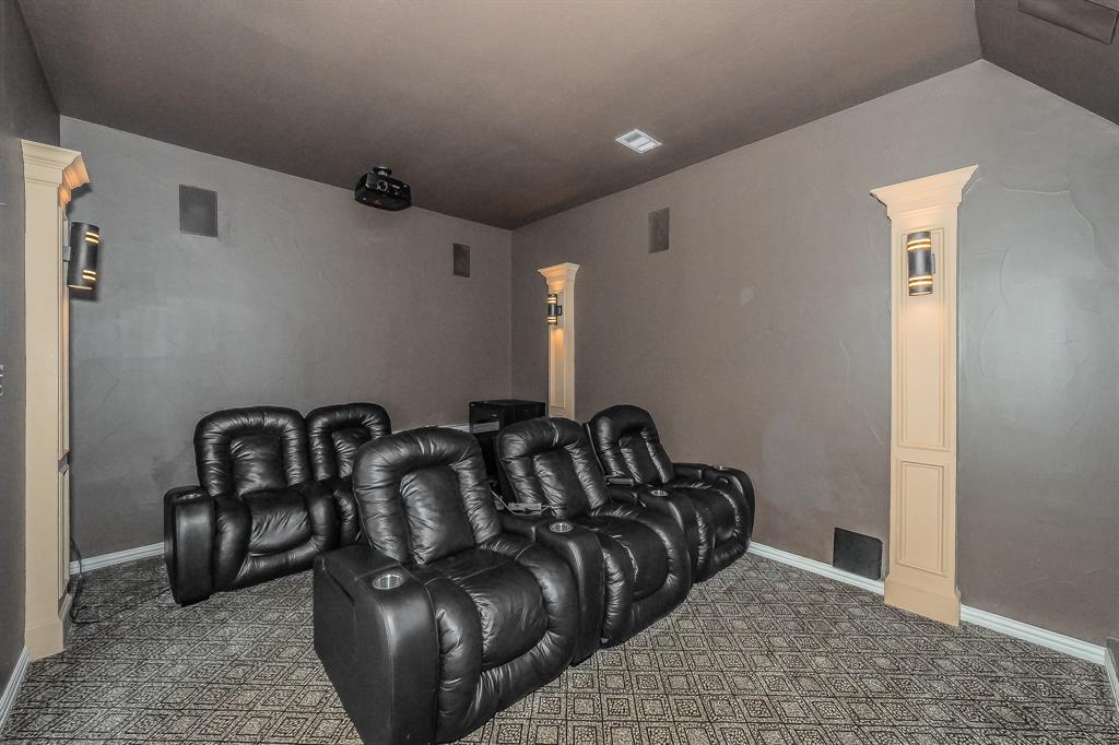 2823 Exeter Drive Trophy Club, TX 76262 - Photo 30 of 40 a bed room with a bed and a couch