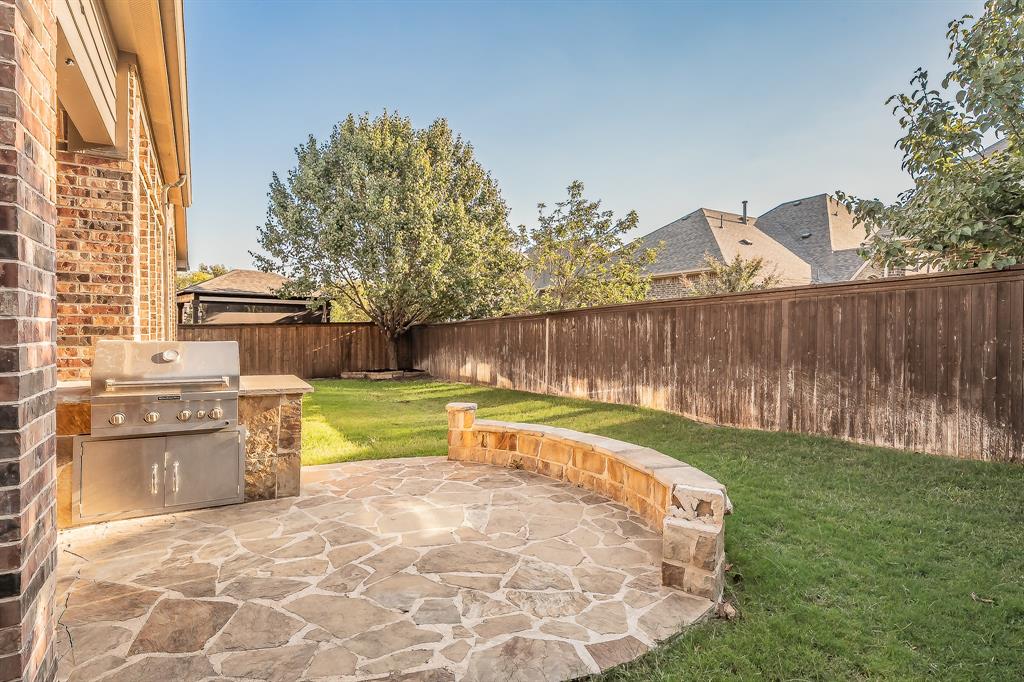2823 Exeter Drive Trophy Club, TX 76262 - Photo 37 of 40 a bathroom with a bathtub and a sink