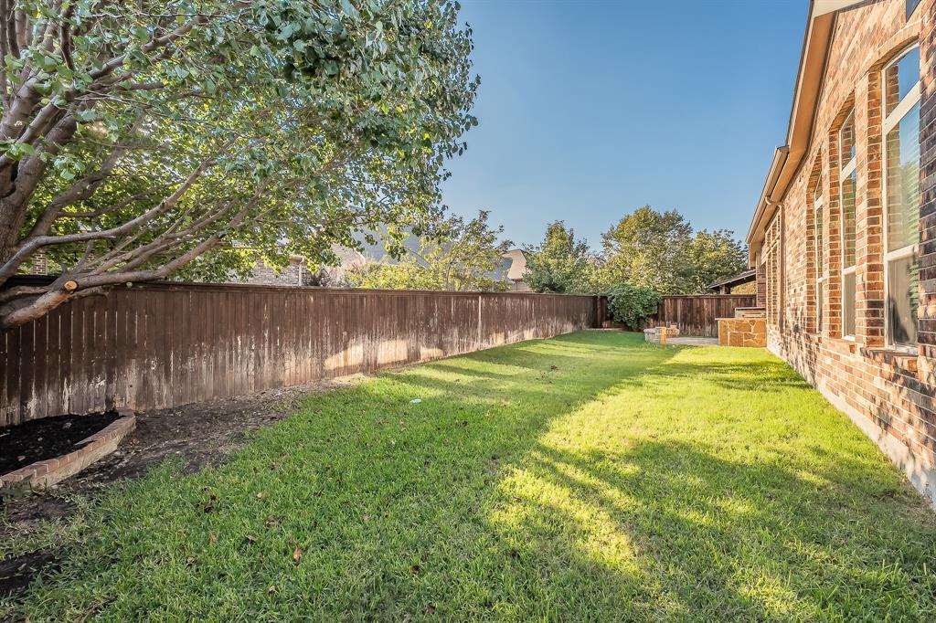2823 Exeter Drive Trophy Club, TX 76262 - Photo 38 of 40 a view of yard with swimming pool and green space