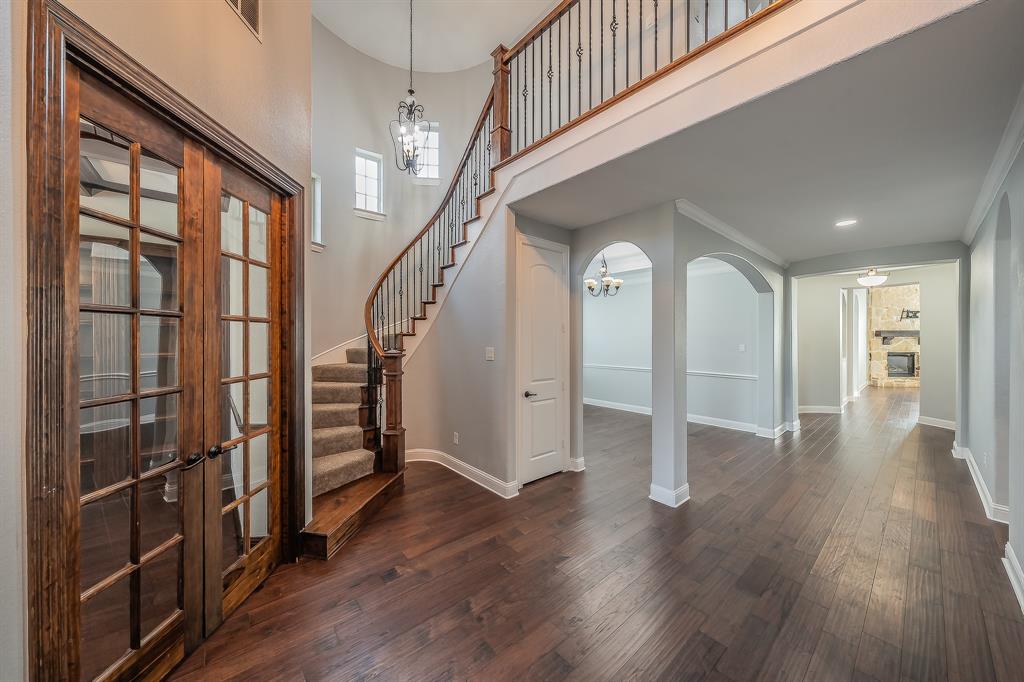2823 Exeter Drive Trophy Club, TX 76262 - Photo 8 of 40 a view of entryway with stairs and wooden floor