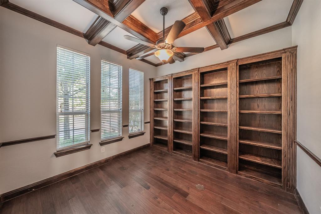 2823 Exeter Drive Trophy Club, TX 76262 - Photo 9 of 40 a view of an empty room with a window and wooden floor