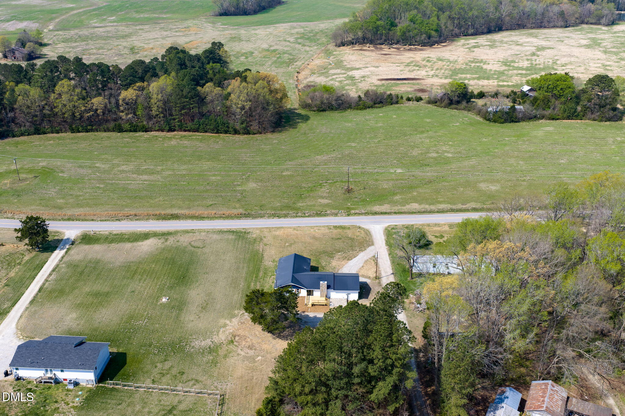 426 Rooker Dairy Road Norlina, NC 27563 - Photo 29 of 33 a view of a lake from a yard