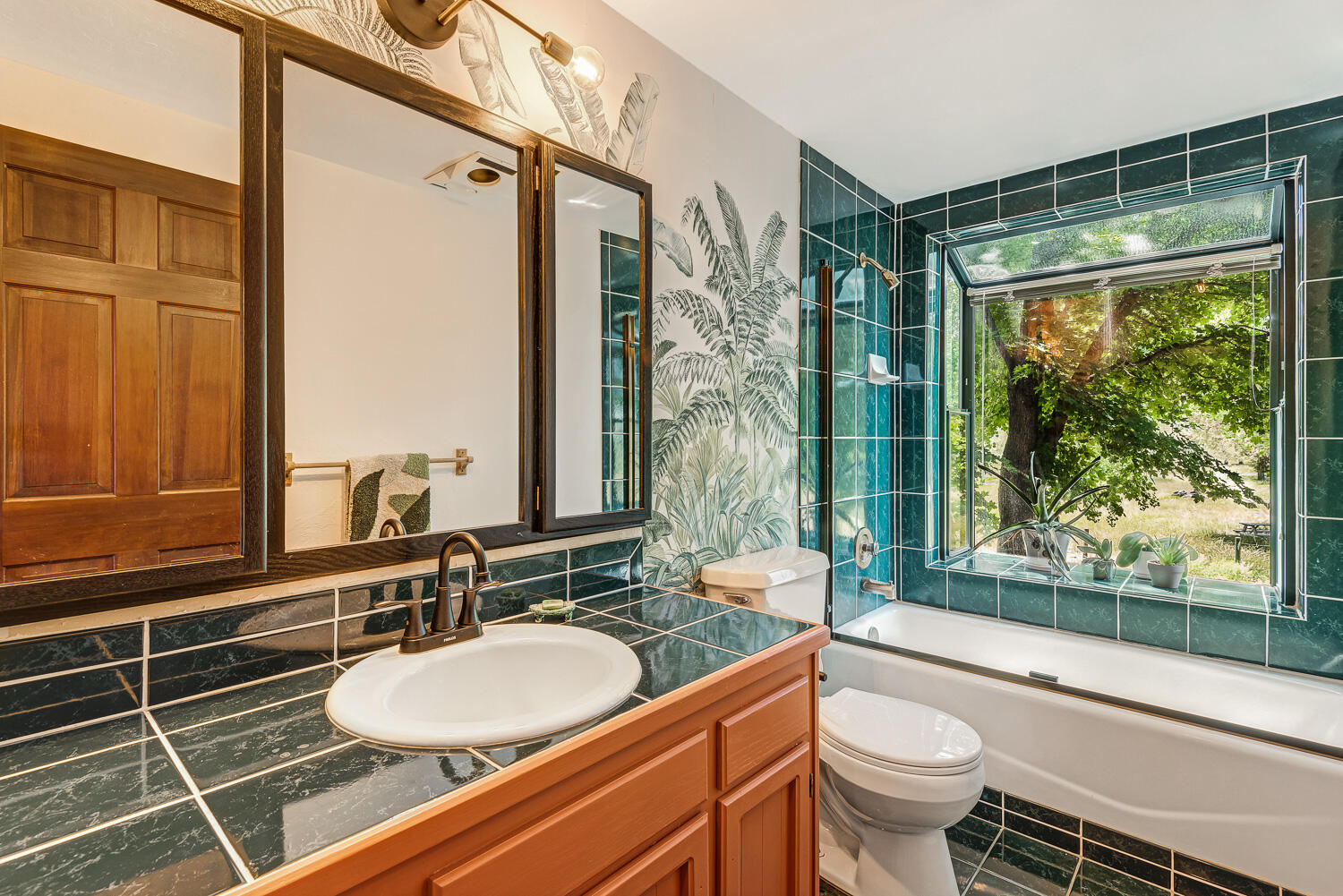 18970 Pinehurst Road Bend, OR 97703 - Photo 28 of 43 a bathroom with a double vanity sink toilet and shower