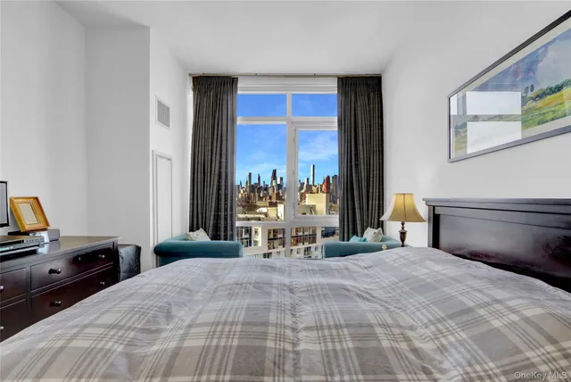 a bathroom with a sink mirror vanity and toilet