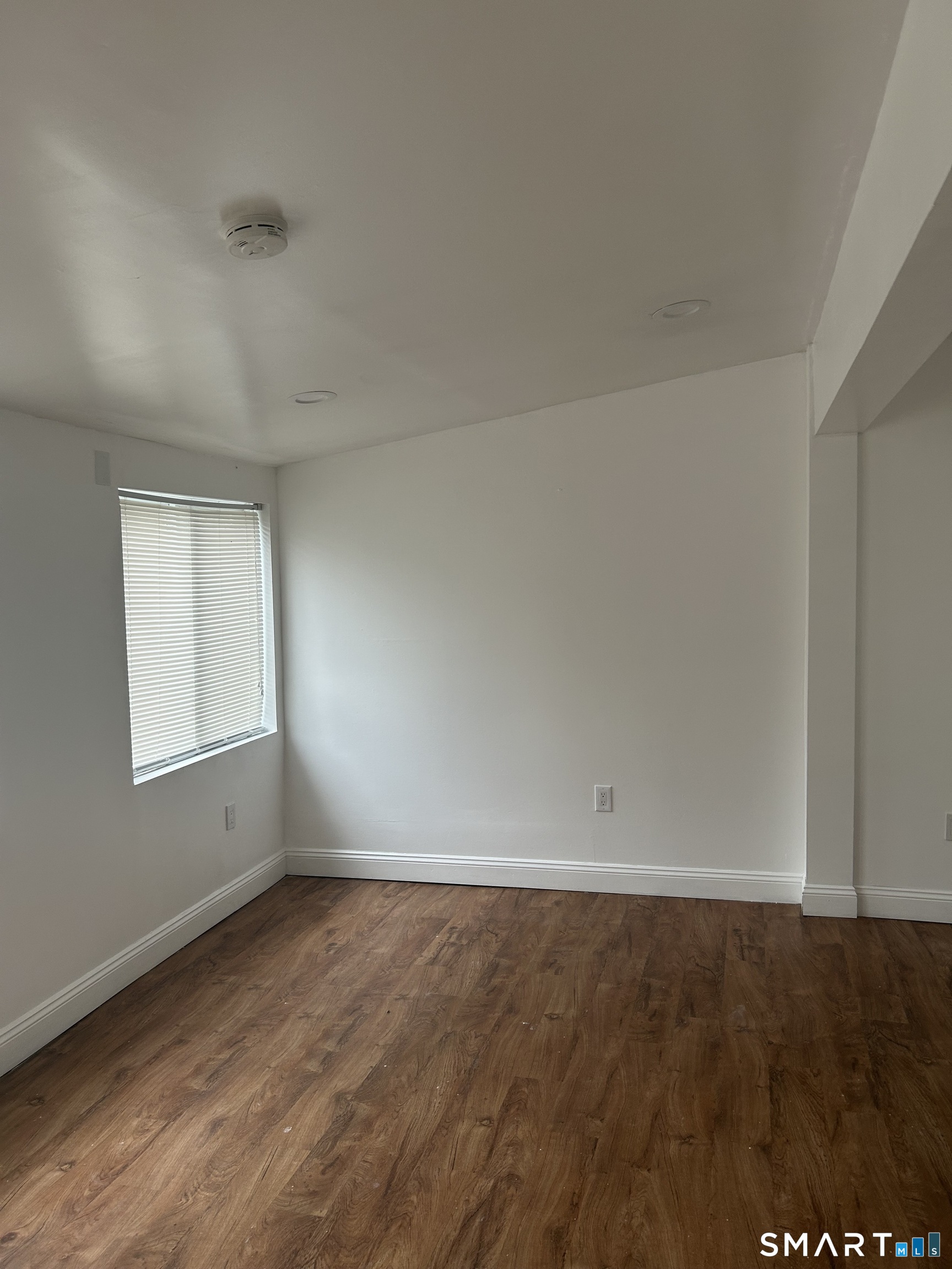 26 Sunnydale Road East Hartford, CT 06118 - Photo 13 of 17 an empty room with a window