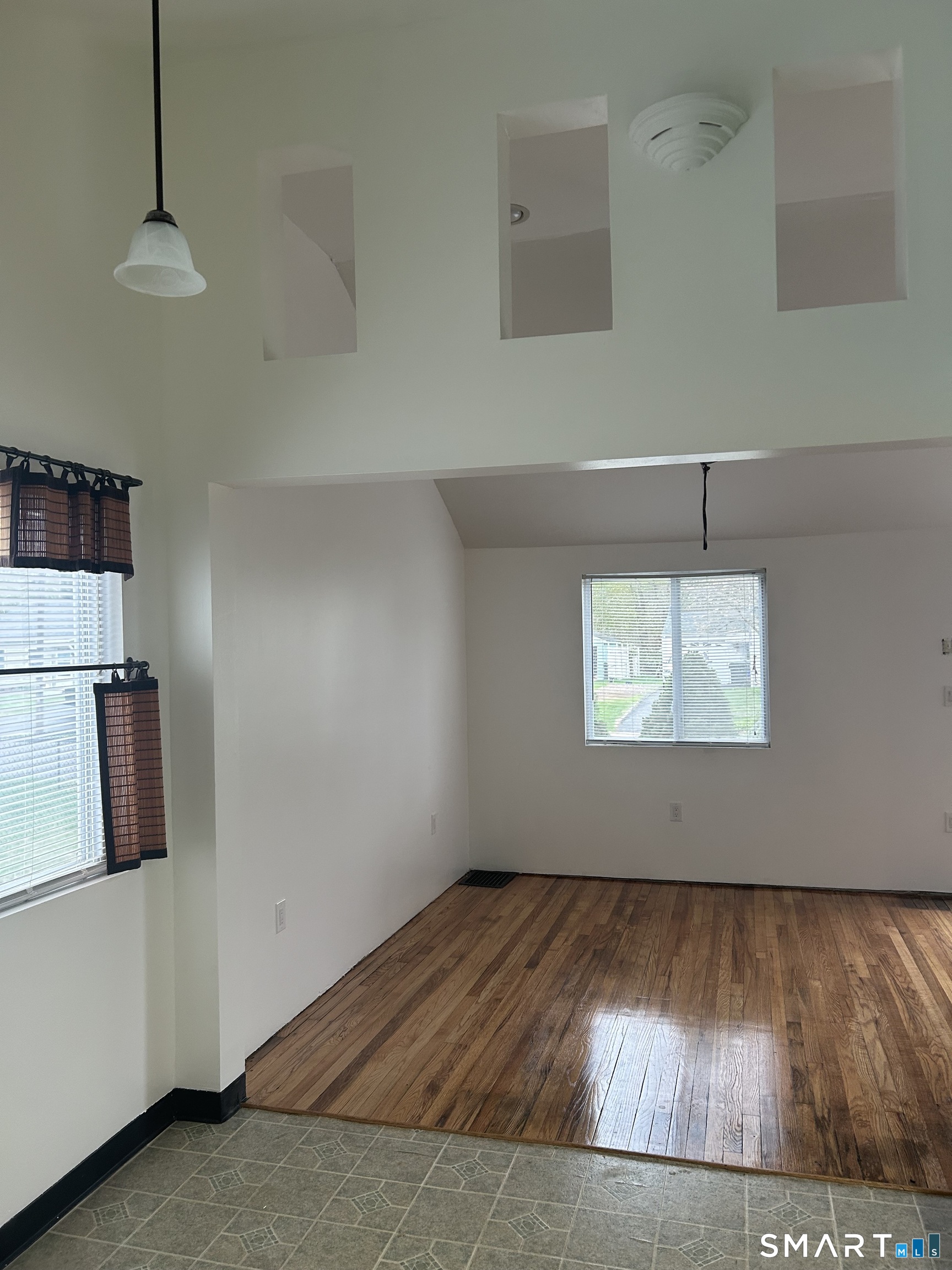 26 Sunnydale Road East Hartford, CT 06118 - Photo 14 of 17 a view of a room with wooden floor and air conditioner
