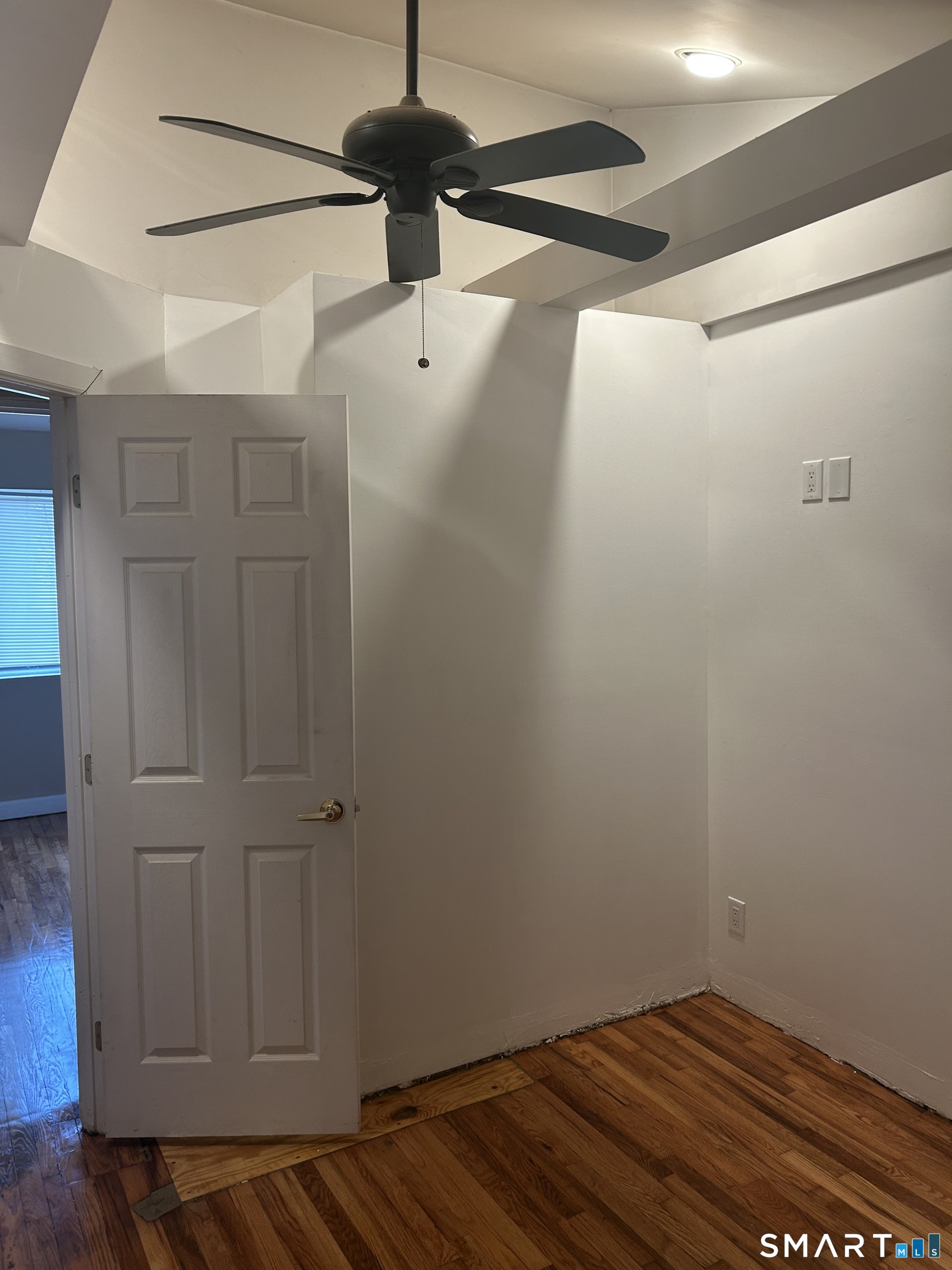 26 Sunnydale Road East Hartford, CT 06118 - Photo 5 of 17 a view of a room with wooden floor
