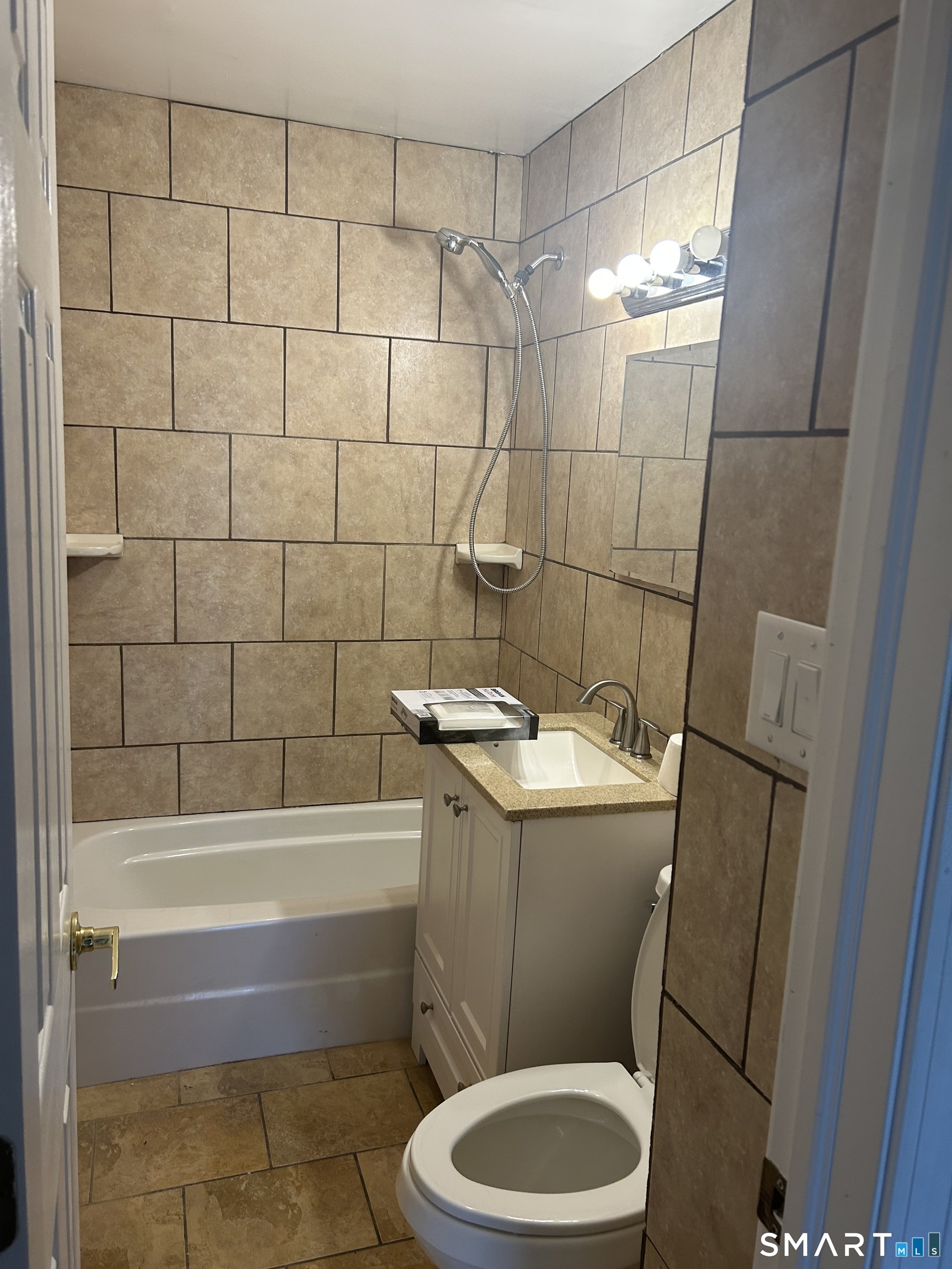 26 Sunnydale Road East Hartford, CT 06118 - Photo 7 of 17 a bathroom with a sink a toilet and shower