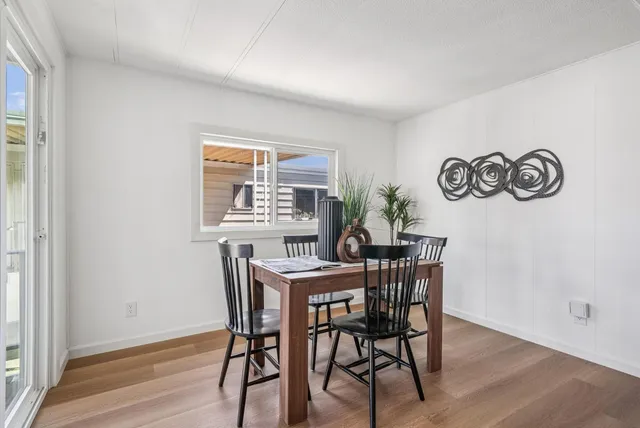 a workspace with furniture and a window