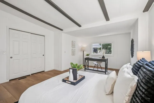 a en suite bathroom with a sink and a mirror