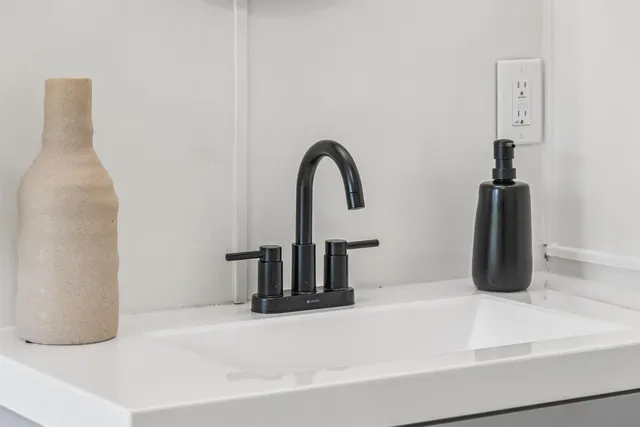 a view of a room with wooden floor and closet