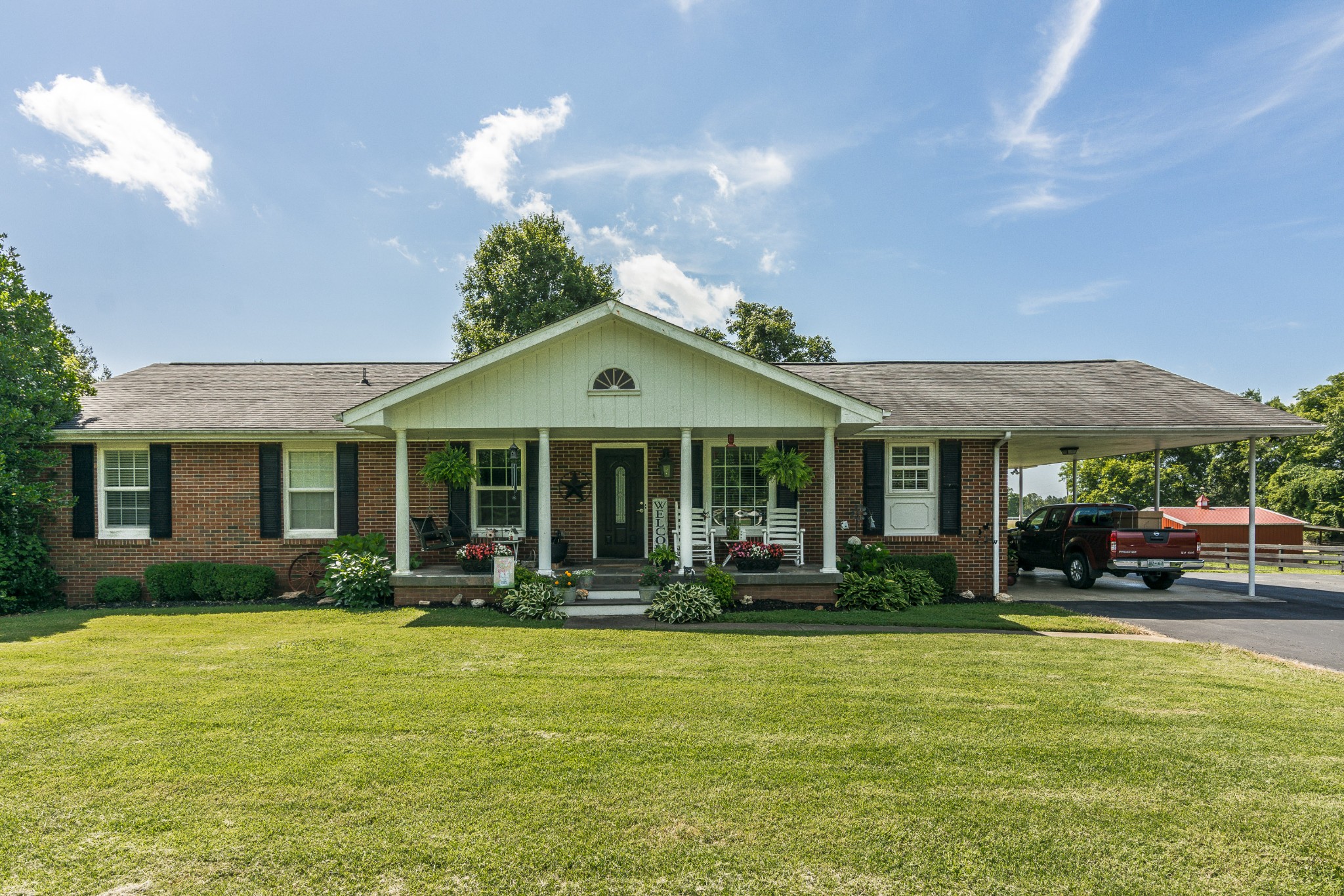 2527 Ewell Elliott Road Springfield, TN 37172 - Photo 1 of 50 a front view of a house with garden