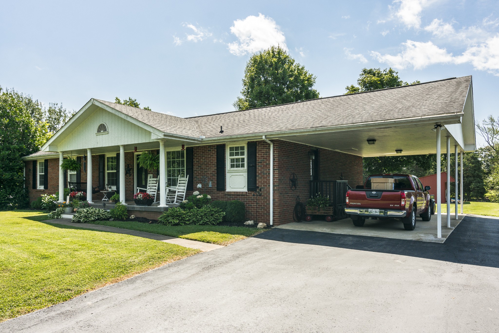 2527 Ewell Elliott Road Springfield, TN 37172 - Photo 2 of 50 a front view of a house with a yard and porch