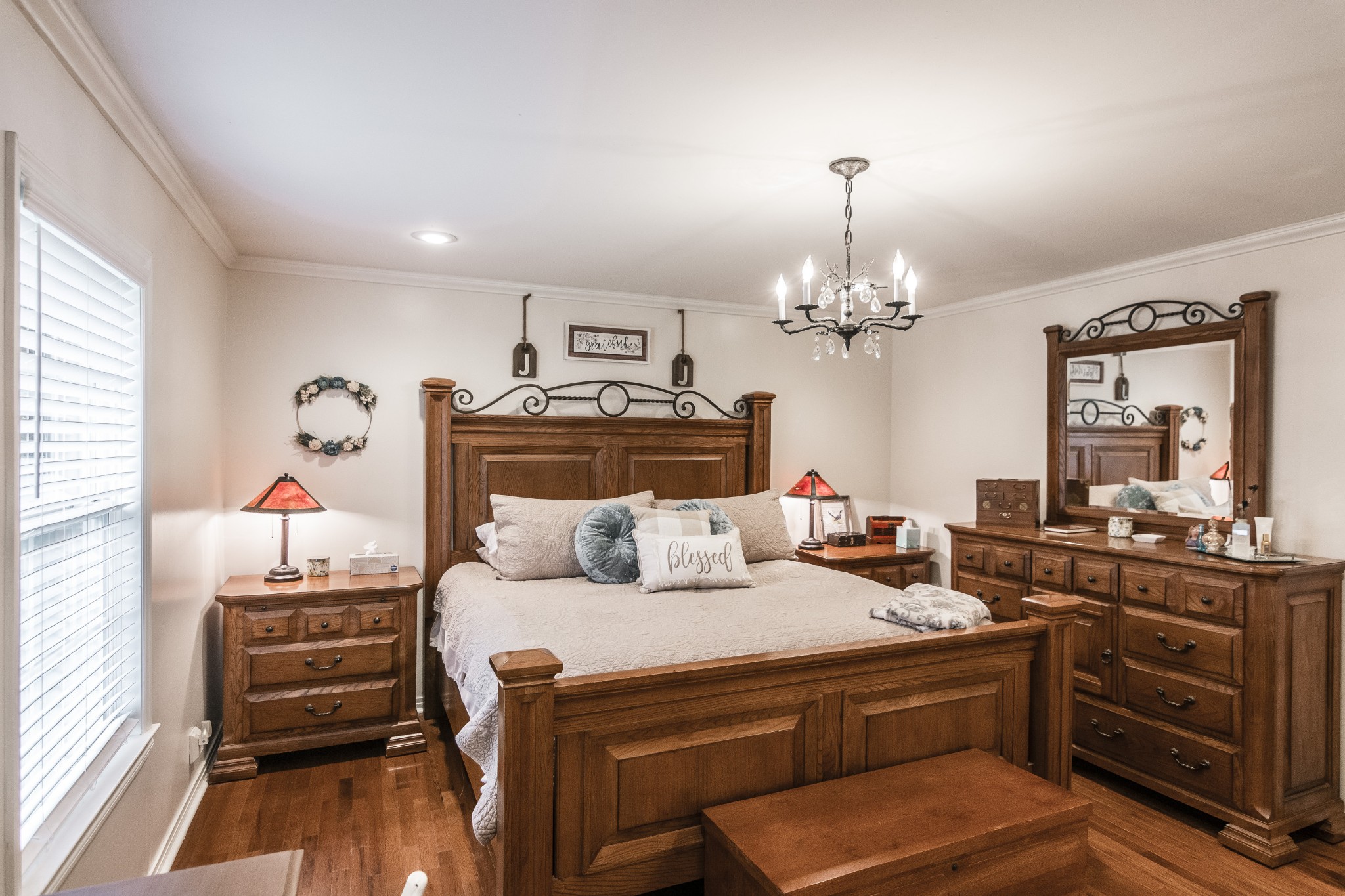 2527 Ewell Elliott Road Springfield, TN 37172 - Photo 17 of 50 a bedroom with a bed and wooden floor