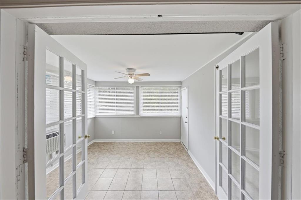 54 La Rue Place Northwest Atlanta, GA 30327 - Photo 13 of 36 a view of an empty room with a window